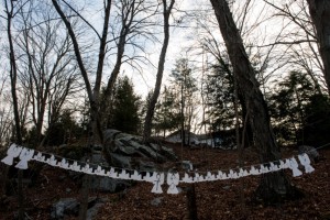 November 23, 2013-SANDY HOOK, CT, USA: Nearly one year after Adam Lanza opened fire on a classroom full of students killing 25 people at Sandy Hook Elementary School and his mother at their home nearby. The town has struggled to reclaim its identity as a quaint New England town. A "Welcome to Sandy Hook" sign of angels hung along highway 34 in Sandy Hook Ct. (Robert Stolarik for JJIE)